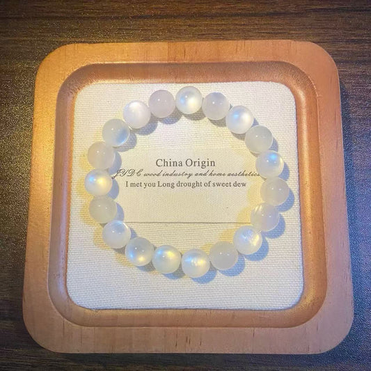 bracelet photochromique UV, perles blanc-lune avant exposition