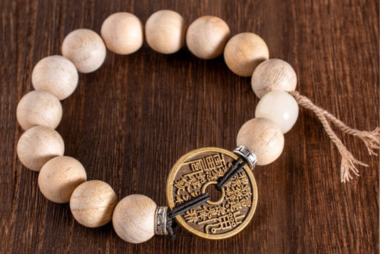Bracelet talisman “Éclair & Montagne” | bois foudroyé | pièce porte-bonheur en laiton