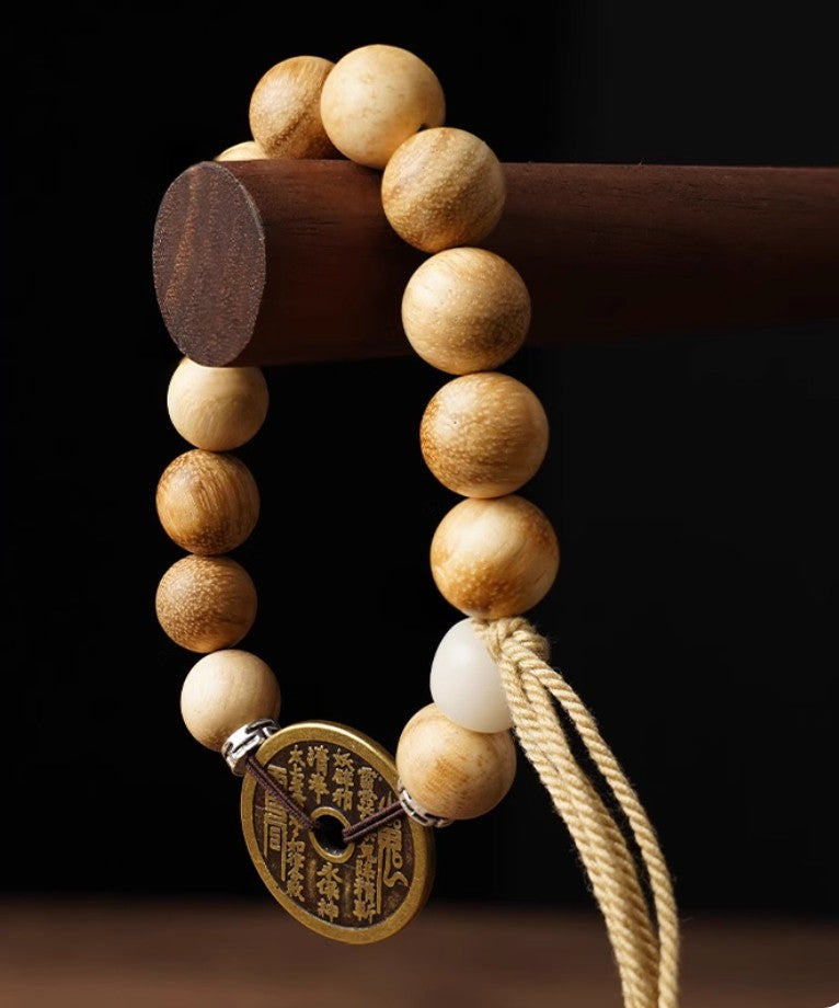 Bracelet talisman “Éclair & Montagne” | bois foudroyé | pièce porte-bonheur en laiton