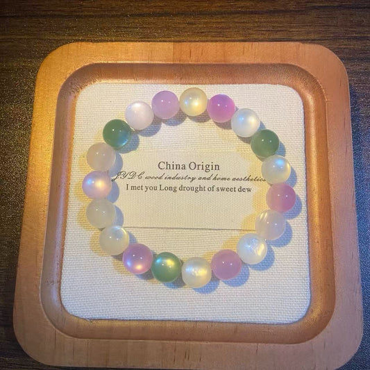 bracelet UV multicolore, teintes pastel sous lumière UV